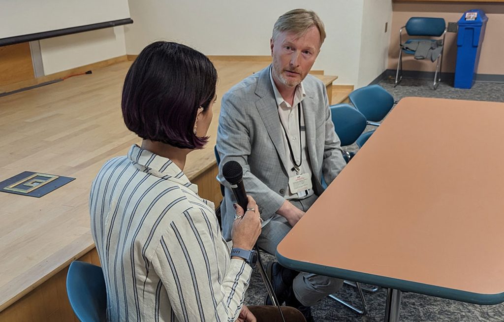 Two people sitting at a table